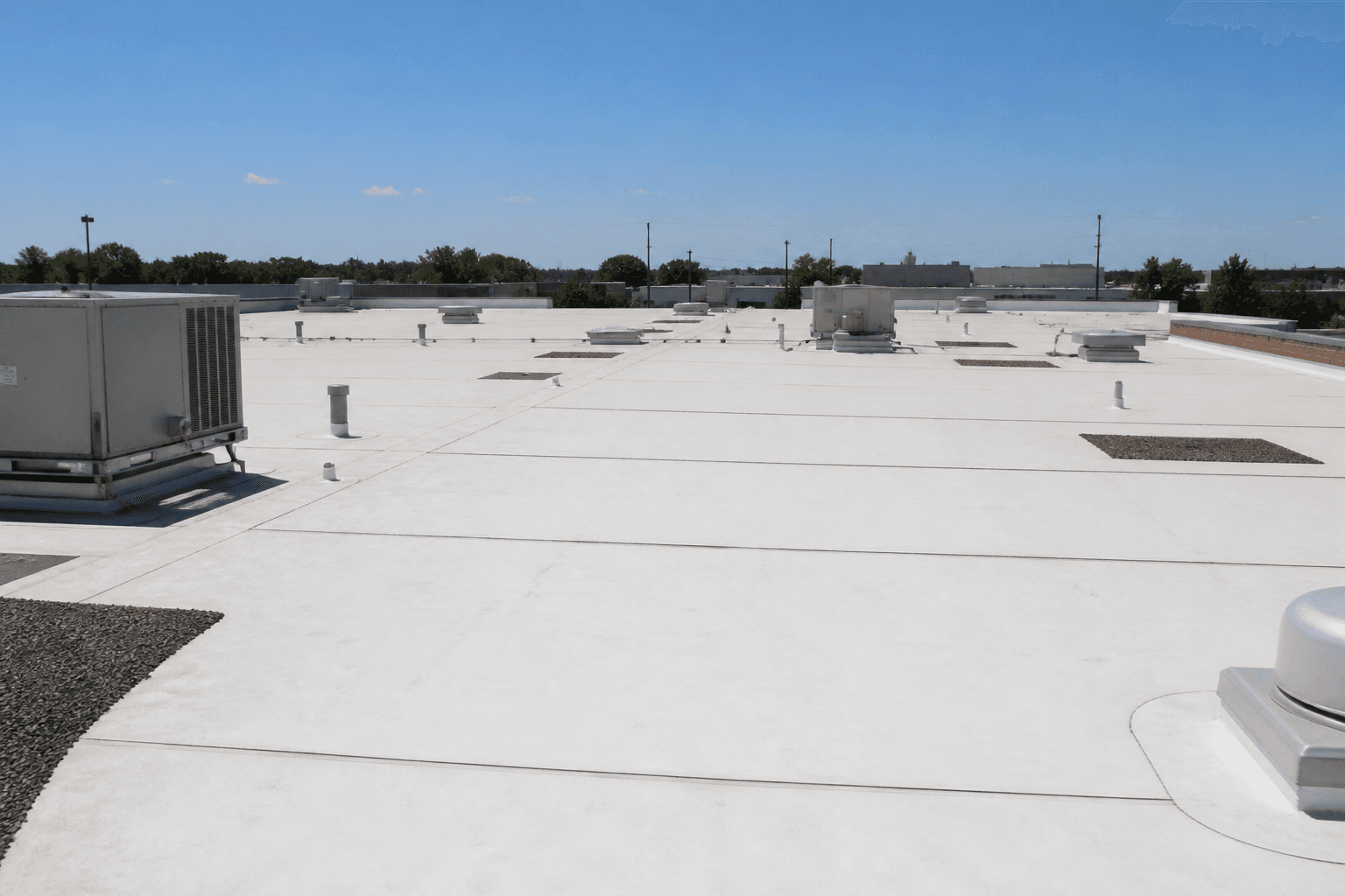 Commercial roofing for buildings and campuses | Warm Home Inc Commercial roofing for buildings and campuses — Warm Home Inc